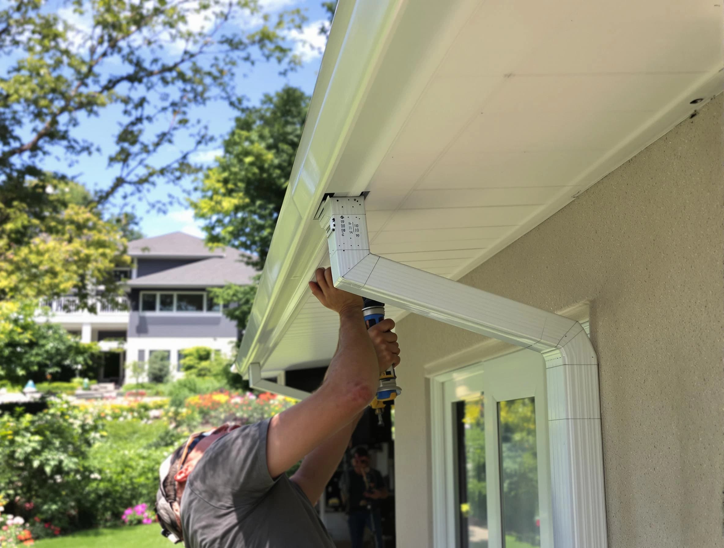 Hudson Roofing Company technicians performing gutter installation in Hudson, OH