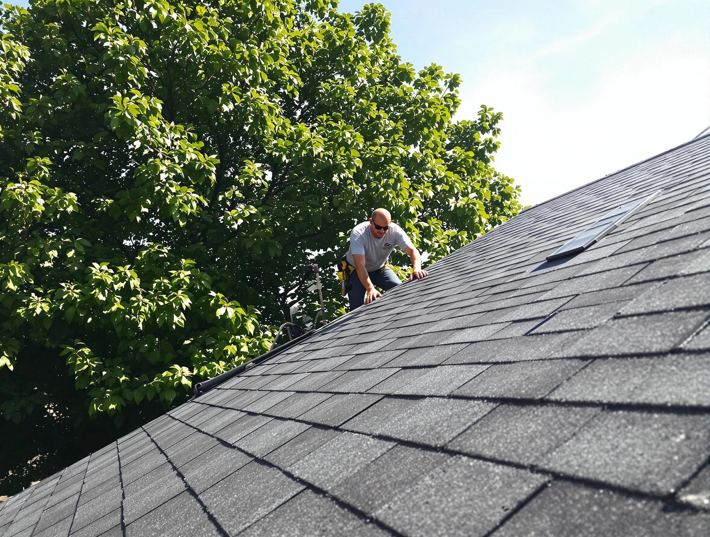 Certified roofers from Hudson Roofing Company working in Hudson, OH